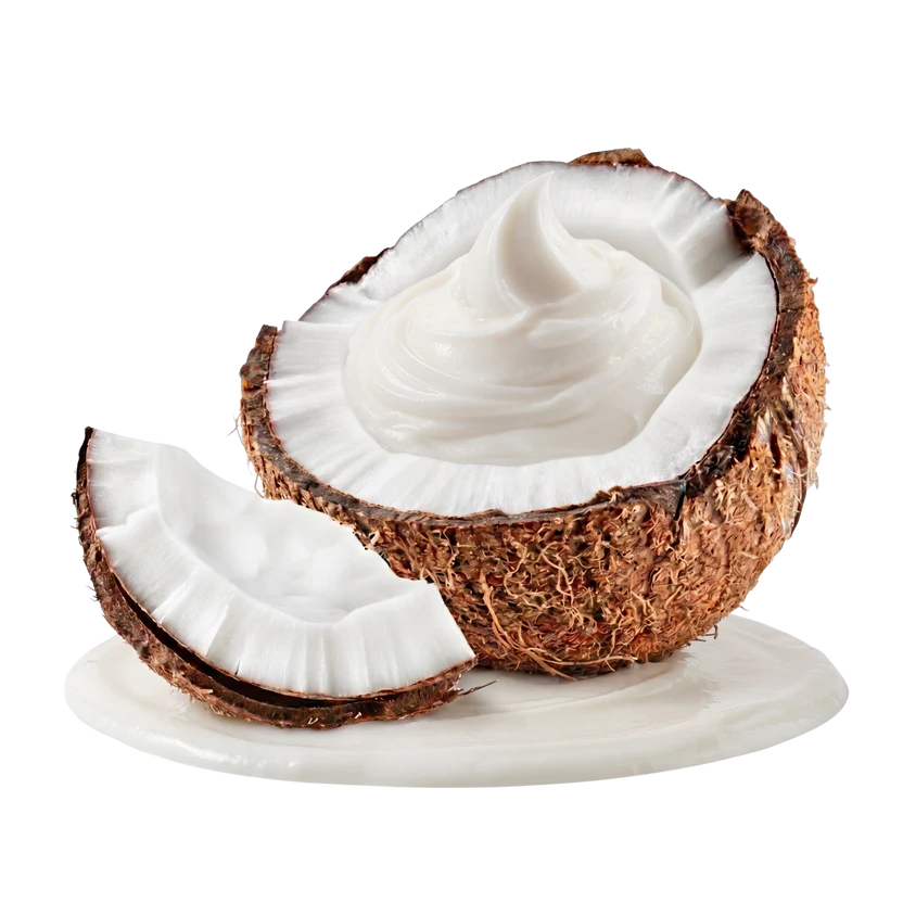 A halved coconut with creamy white coconut cream inside, shown with a smaller cut piece in front on a white surface