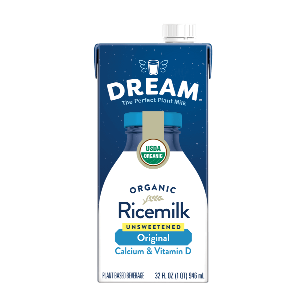 A 32 fl oz carton of Dream Organic Rice milk, Unsweetened, Calcium & Vitamin D. The carton features a dark blue top half with white starry speckles, a white lower half, and a blue cap with a gold USDA Organic seal.
