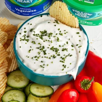A bowl of garlic chive sour cream dip made with Follow Your Heart Dairy Free Sour Cream