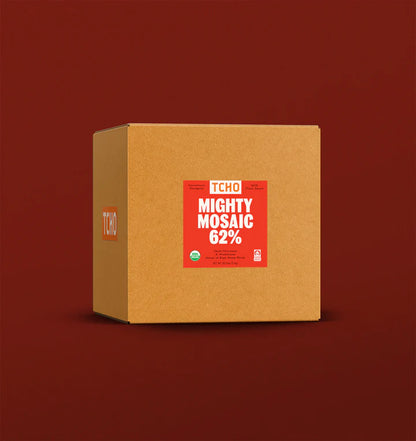A brown cardboard box with a red label that says "TCHO Mighty Mosaic 62%"