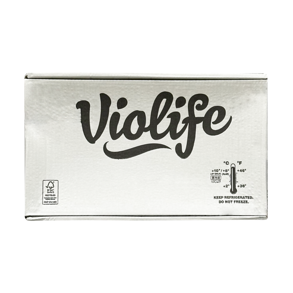 A white box of 24 lb Violife Just Like Cream Cheese with a picture of a thermometer and instructions to keep refrigerated but do not freeze.